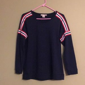 Navy blue shirt with stripes.